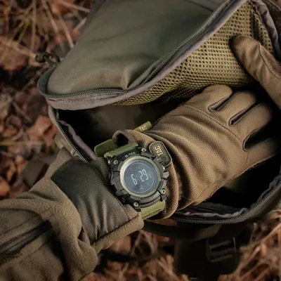 Zegarek taktyczny M-TAC Adventure Czarny/Oliwkowy (50005001) z kopertą poliwęglanową i bezel stali nierdzewnej, umożliwiający monitorowanie warunków atmosferycznych i planowanie aktywności fizycz